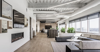 办公室装修设计：中性地板选择结合了量身定制的图案以带来传统的感性