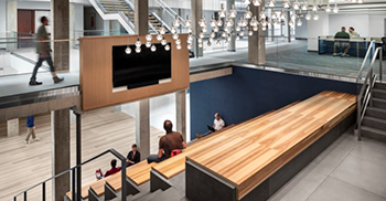 公司办公楼设计装修：沉重的木质装饰和栏杆被反映组织透明度的玻璃细节所取代
